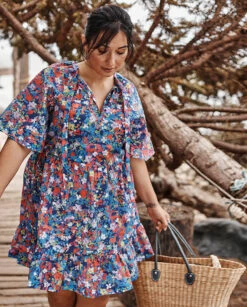 The Tie Neck Tiered Dress - Painted Meadows 6 The Tie Neck Tiered Dress - Painted Meadows -Deals US Tropic Bikini Store 3 ModelFullBody 4ceec5f0 2958 4a03 9b9b ef817299e728