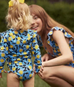 The Girls' Ruffle Rash Guard Tankini Set - Nectarine Orchard -Deals US Tropic Bikini Store 4 ModelDetail 82eb6907 3974 4be9 93da 98d266fdb3a4