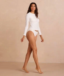 The Waterside Ruffle Rash Guard - White Sand -Deals US Tropic Bikini Store PDP WatersideRuffleRashGuard WhiteSand Front Full